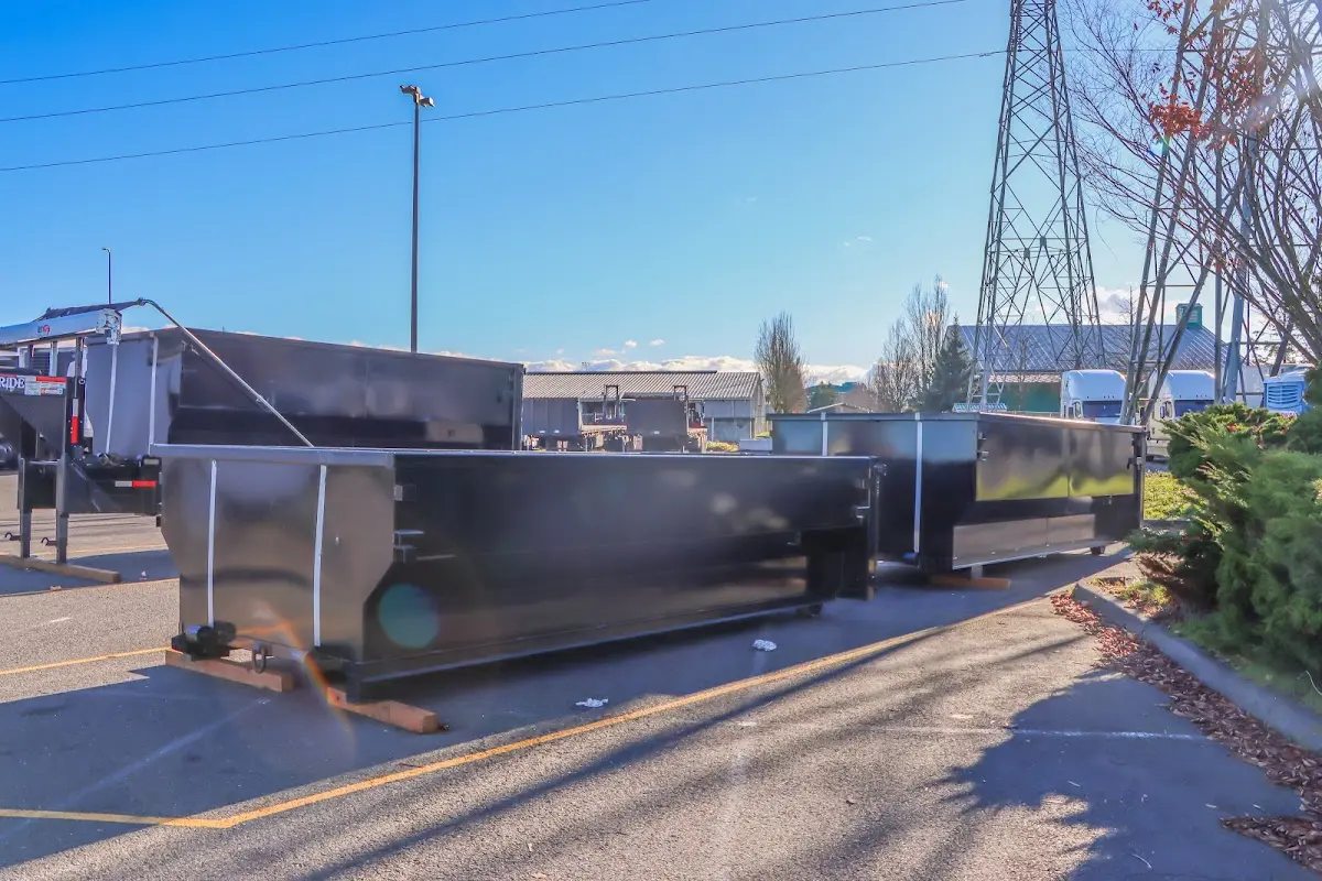 Roll-off dumpster ready for waste disposal at job site for 2 Yard Dumpster Rental in Stoughton